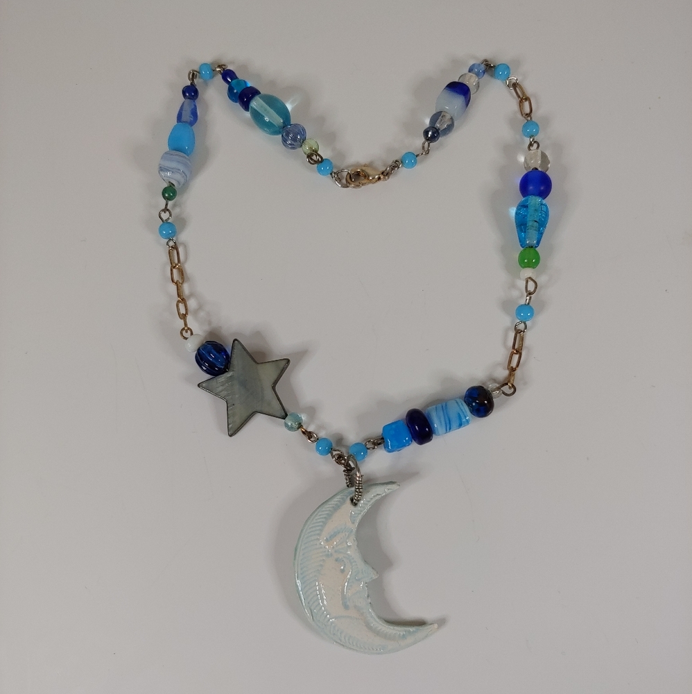 🧀  Blue Art Glass Crescent